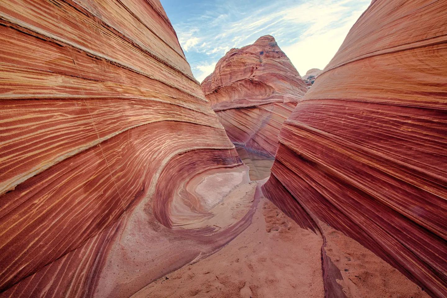 Cross-bedded sandstone forming red and ochre waves, Coyote Buttes, Arizona.